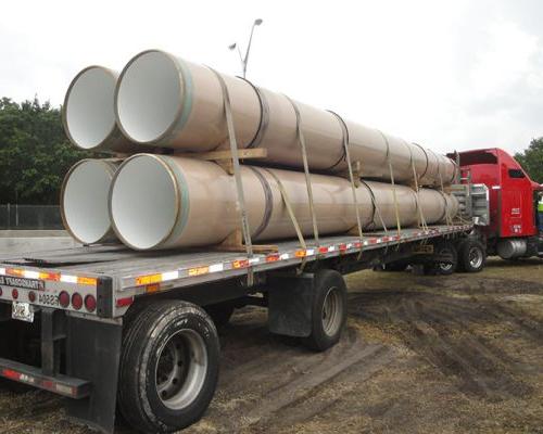 Pipes on a semi-truck bed